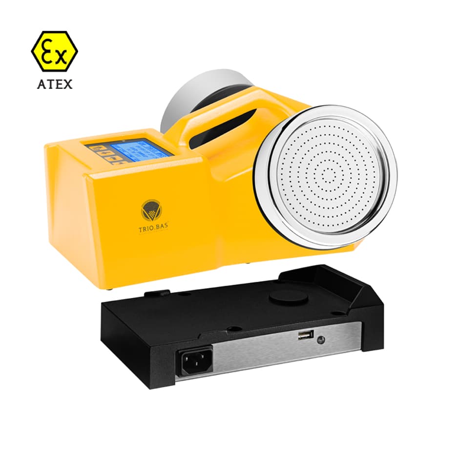 ATEX-zertifizierter Luftkeimsammler TRIO.BAS DUO in gelber Signalfarbe mit Ladestation – für schnelle visuelle Erkennung im Reinraum